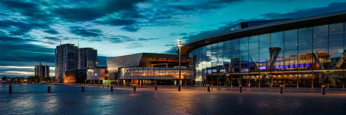 Manchester sports entertainment hub at dusk