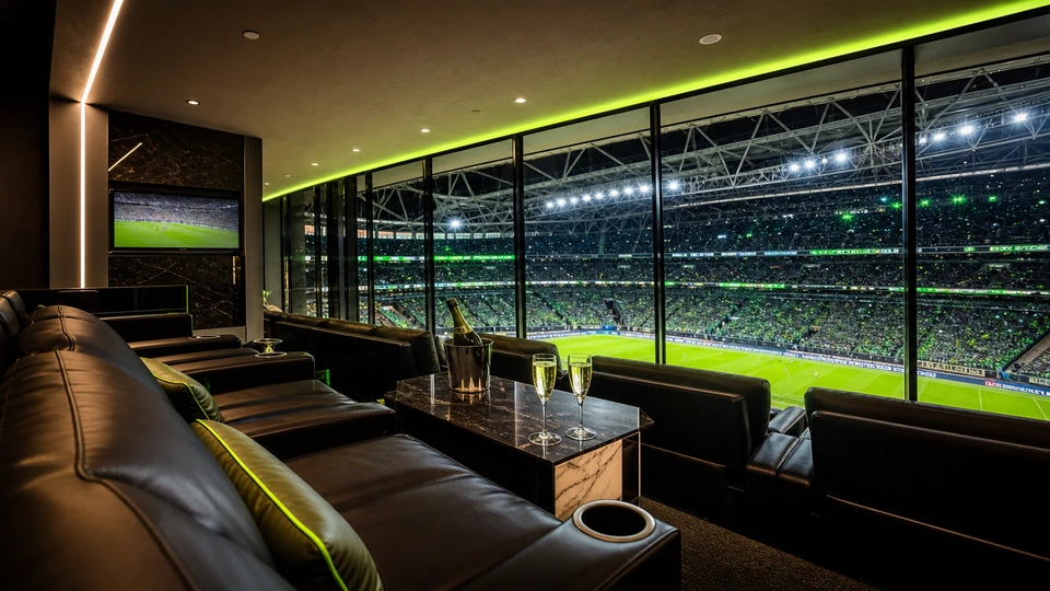Exclusive VIP stadium lounge overlooking a night arena